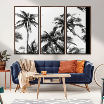 Black and white canvas of tall palm trees in moody tones, perfect for modern tropical minimalist or coastal-style home decor.