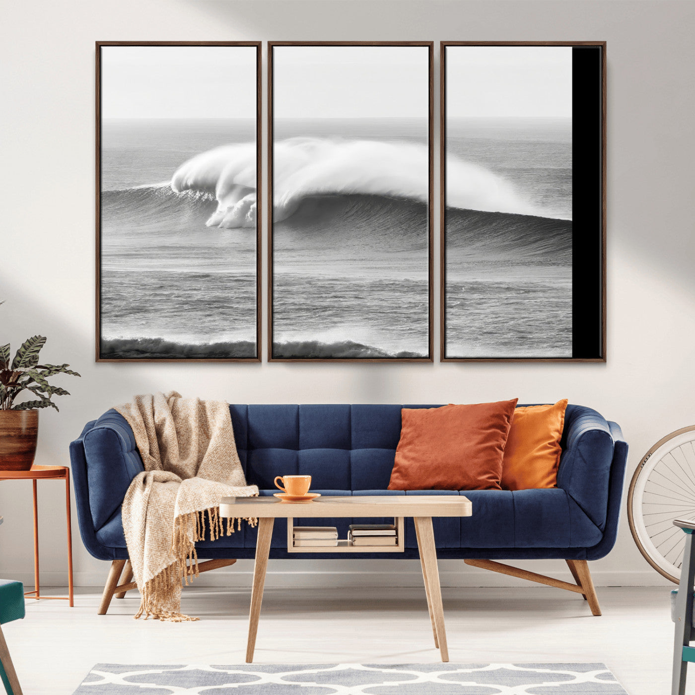 A dramatic black and white ocean wave crashing with immense force, capturing the raw power and movement of the sea in a bold seascape.