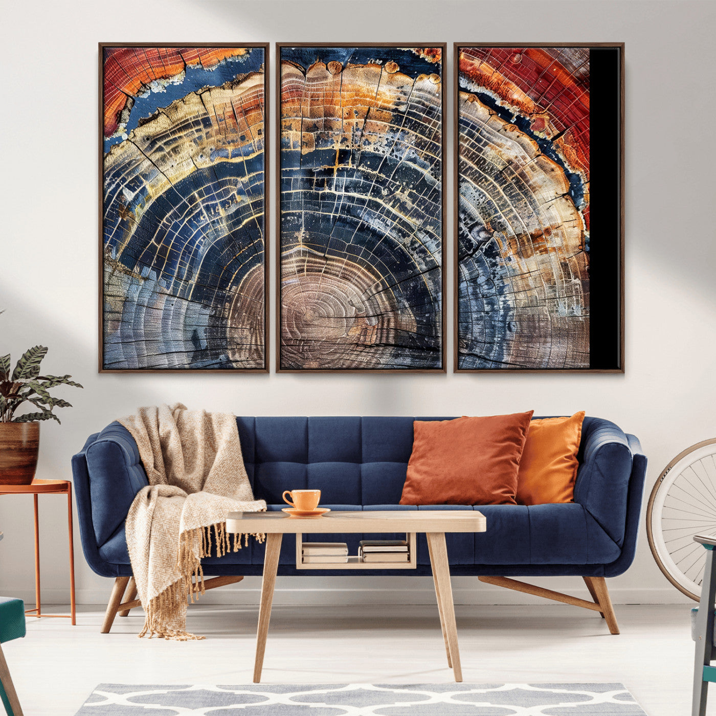 Vibrant tree ring with orange, brown, and blue tones in abstract detail, perfect for rustic or boho-inspired wall decor.