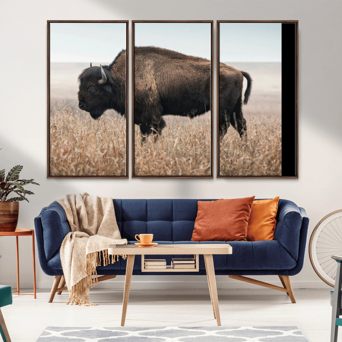 A lone bison stands in a vast prairie under a soft sky, evoking freedom and rustic charm for western or farmhouse inspired interiors.