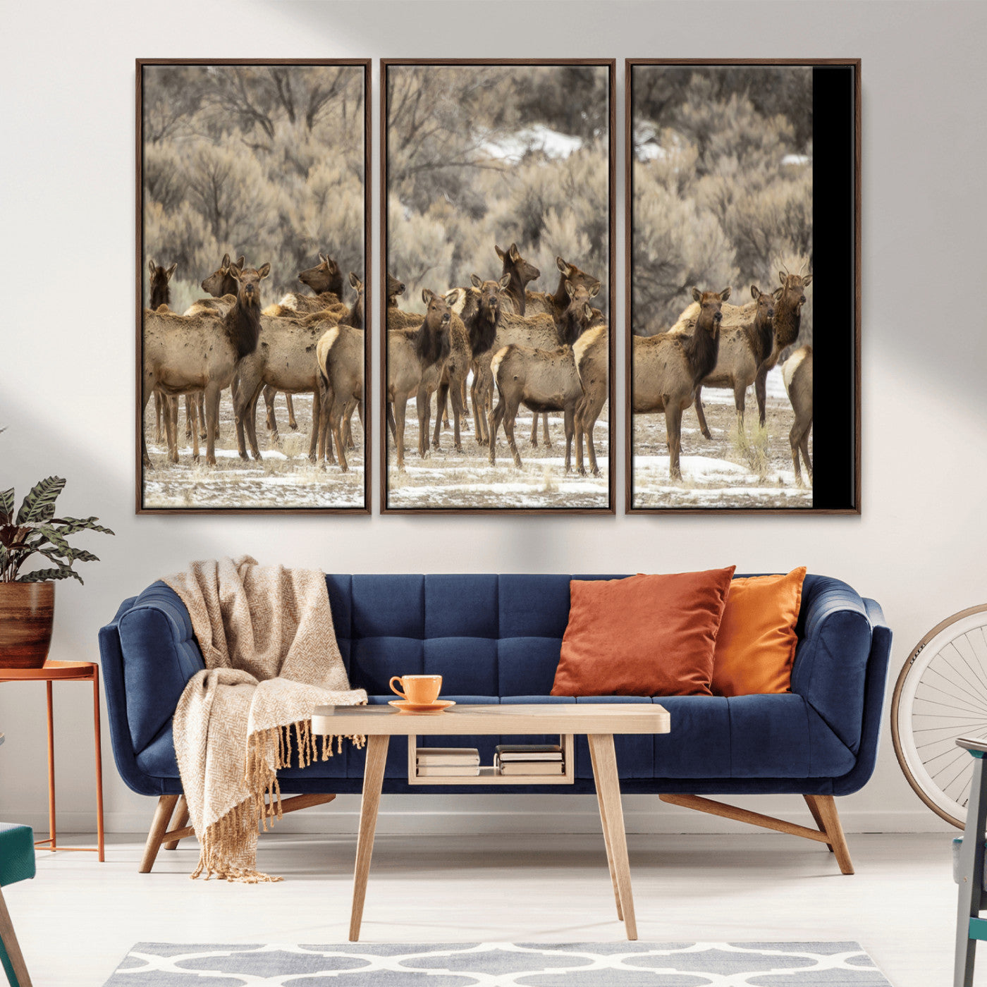 A large herd of elk standing in an open field with soft earthy tones, ideal for rustic lodge or western-themed home wall decor.