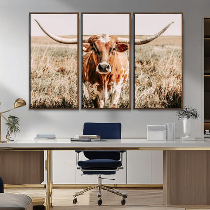 Framed longhorn cow canvas wall art with rustic prairie background, western animal print perfect for farmhouse or ranch style decor