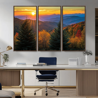 Vibrant sunset over autumn mountains with colorful trees and warm light, ideal for nature lovers or cabin-style wall decor.