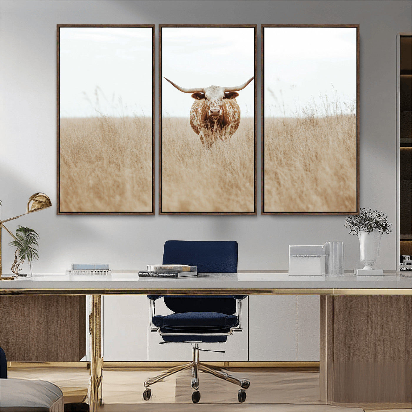 Texas Longhorn bull standing alone in dry grass with neutral tones, ideal for rustic western or cowboy-themed wall decor.