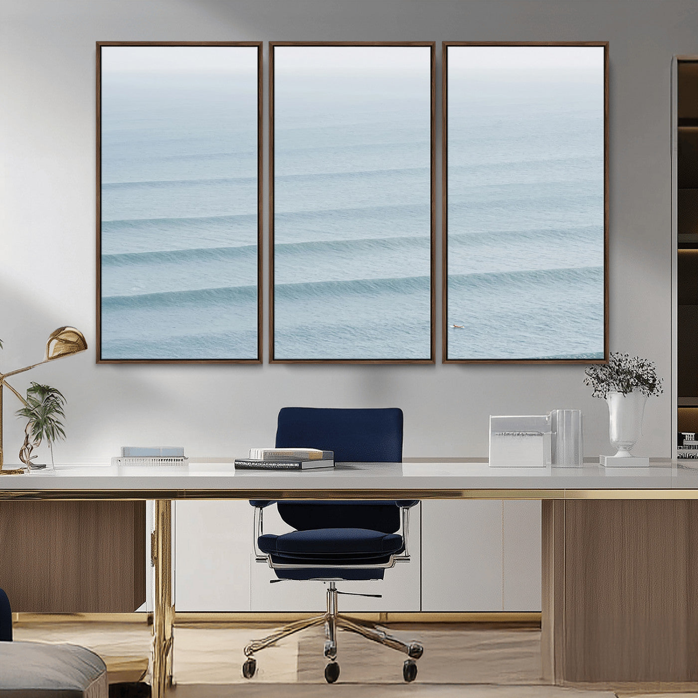 Framed canvas of repeating ocean waves with a distant solo surfer, ideal for minimalist ocean or calm coastal wall decor.