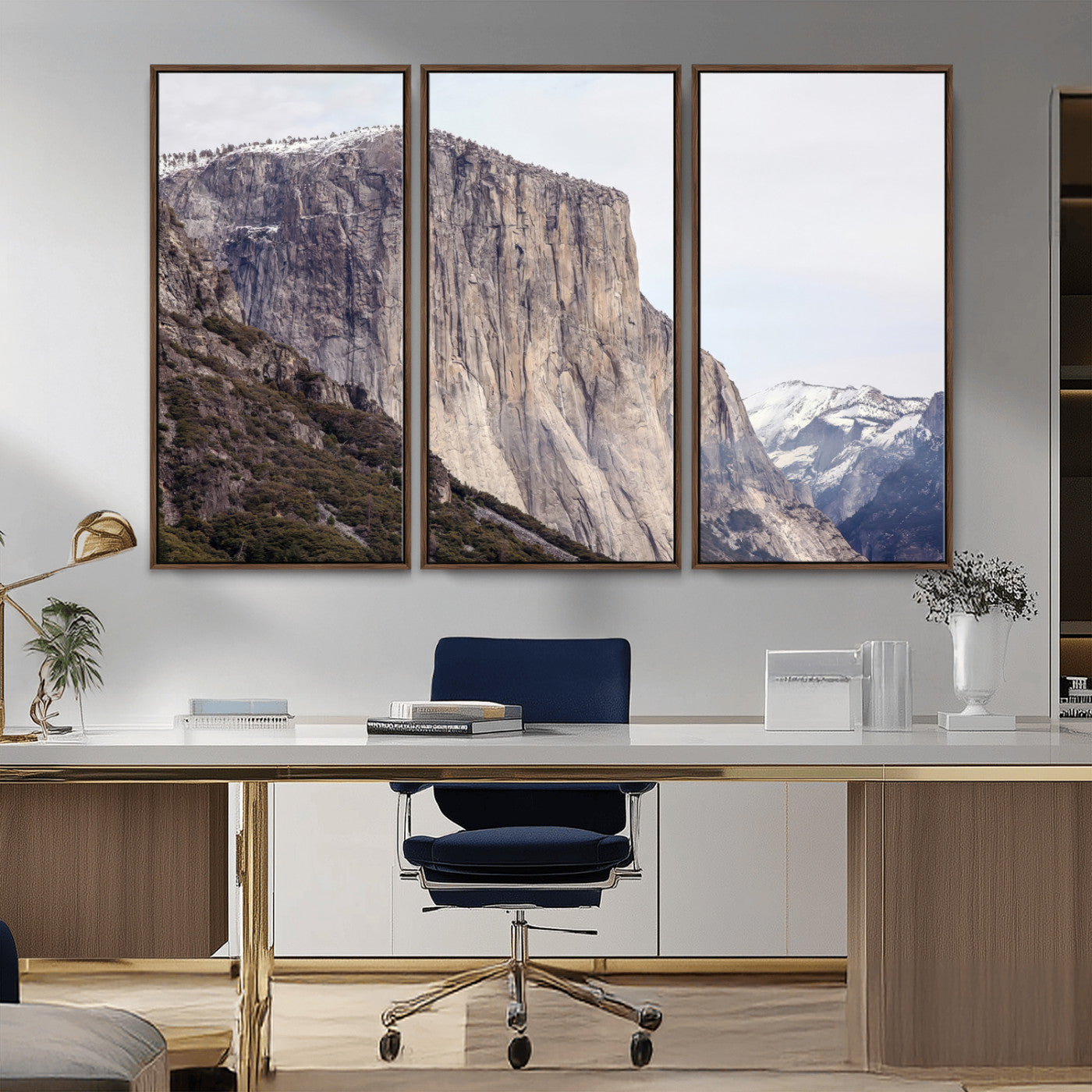 Framed canvas of El Capitan’s vertical granite face in Yosemite with snowy peaks, ideal for Sierra minimalism or mountain-inspired decor.