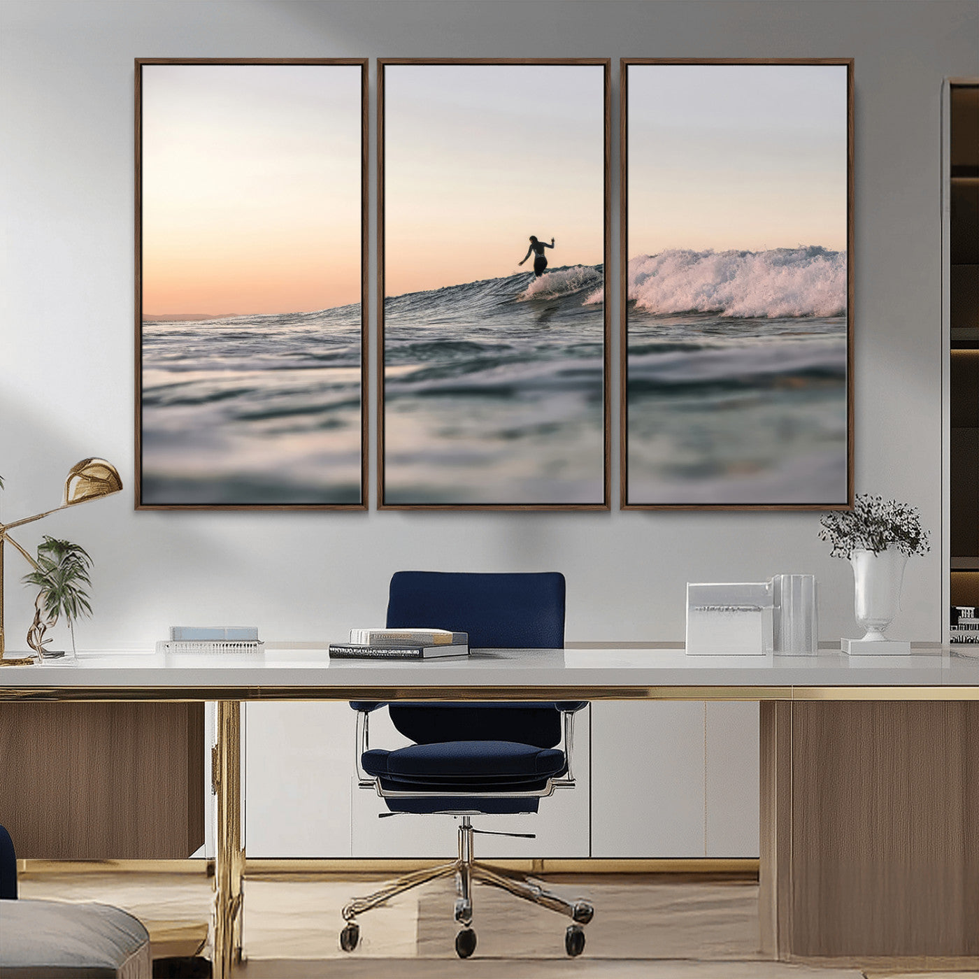 Framed canvas of a female surfer balancing on a wave at sunset, perfect for serene surf or ocean-inspired coastal decor.