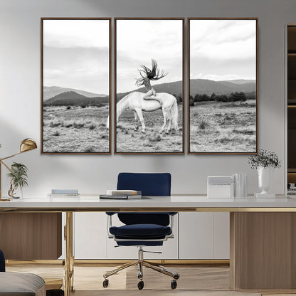 Black and white photo of a woman on a white horse in moody tones, ideal for Western Boho or modern rustic-style home decor.