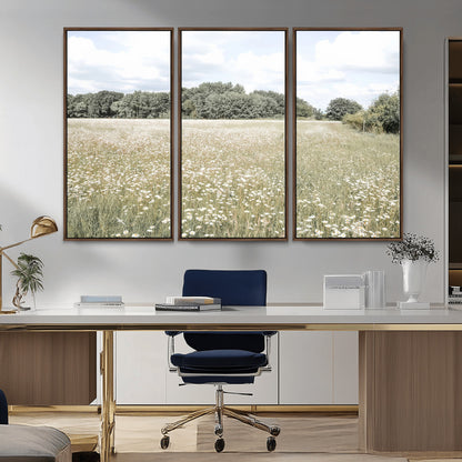 Soft-toned image of a wild daisy field under a cloudy sky, ideal for neutral or Scandinavian-inspired home decor.