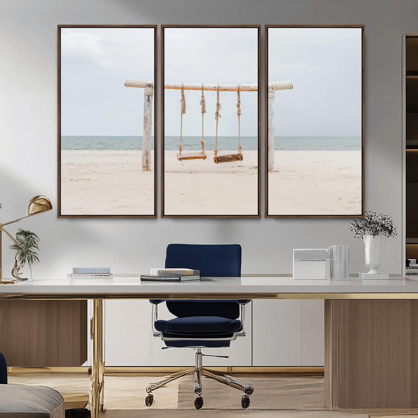 A rustic wooden beach swing stands on a serene sandy shore with an ocean horizon in the background, creating a tranquil and dreamy coastal escape.