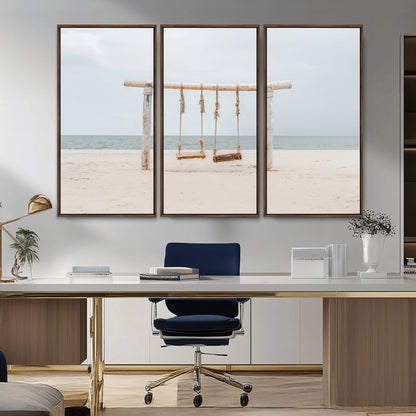 A rustic wooden beach swing stands on a serene sandy shore with an ocean horizon in the background, creating a tranquil and dreamy coastal escape.