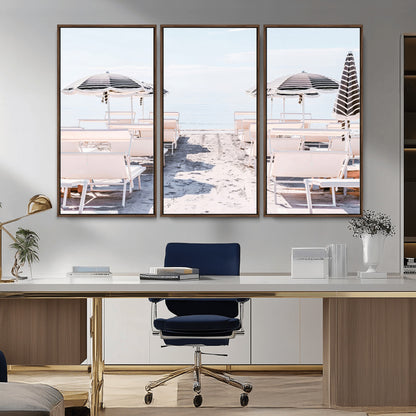 A serene minimalist beach scene featuring striped umbrellas, soft pastel sand, and an elegant lounge setup, creating a tranquil and stylish coastal retreat.