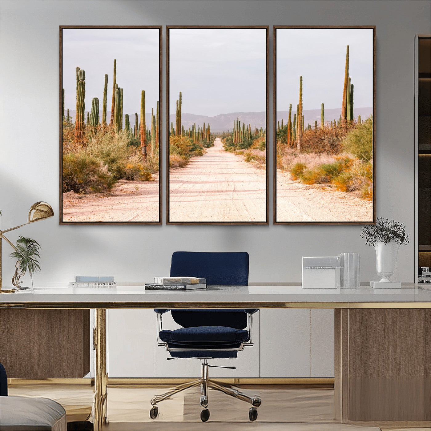 A desert road lined with saguaro cacti under a golden sky, creating a warm southwestern feel, perfect for boho or rustic decor.