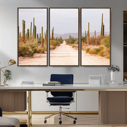 A desert road lined with saguaro cacti under a golden sky, creating a warm southwestern feel, perfect for boho or rustic decor.