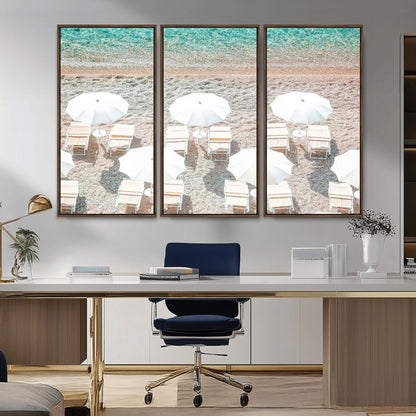 A bright beach scene with white umbrellas, pastel sand, and turquoise waters, creating a tranquil coastal vibe, perfect for beach house or summer decor.
