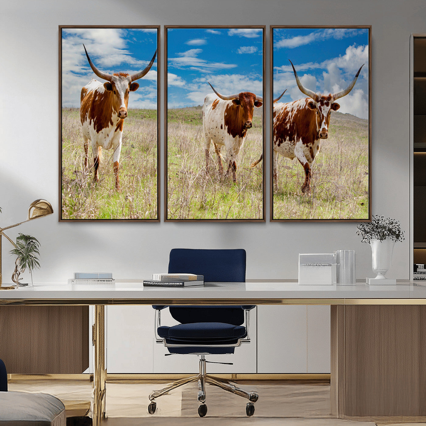 Three Texas longhorn cattle standing in dry grass under a bright blue sky, ideal for farmhouse or western rustic home decor.
