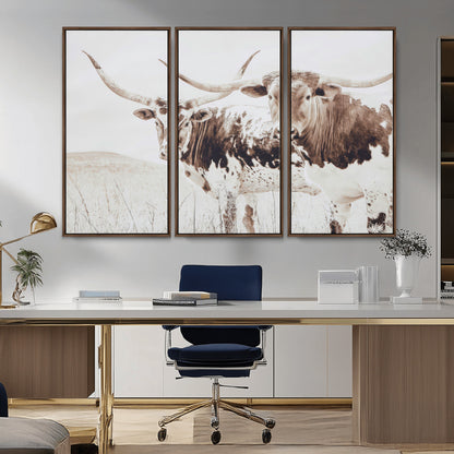 Two longhorn cows standing in a sepia-toned pasture with soft light, ideal for rustic or farmhouse-themed neutral wall decor.