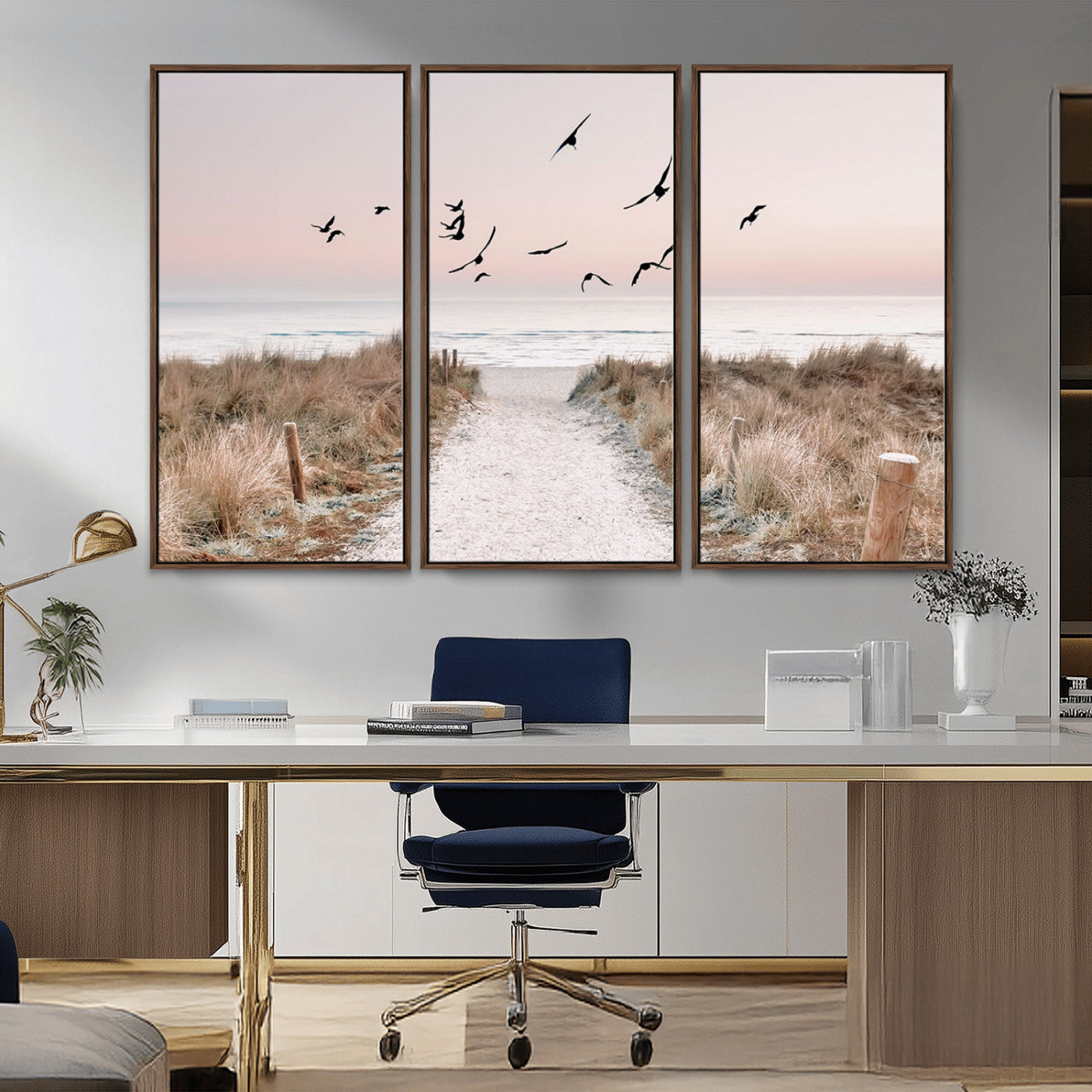 A peaceful coastal pathway leading to the ocean, with birds flying across a soft pastel sky, creating a calm and scenic beach atmosphere.