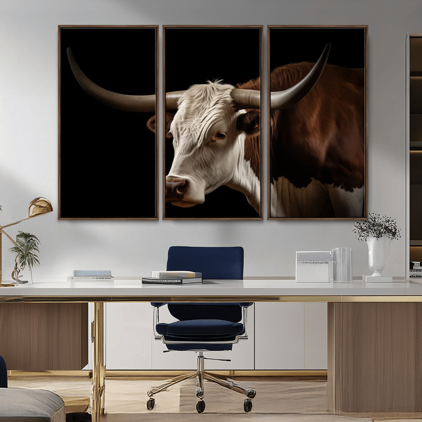 "Close-up of a brown and white longhorn cow with prominent curved horns against a black background."