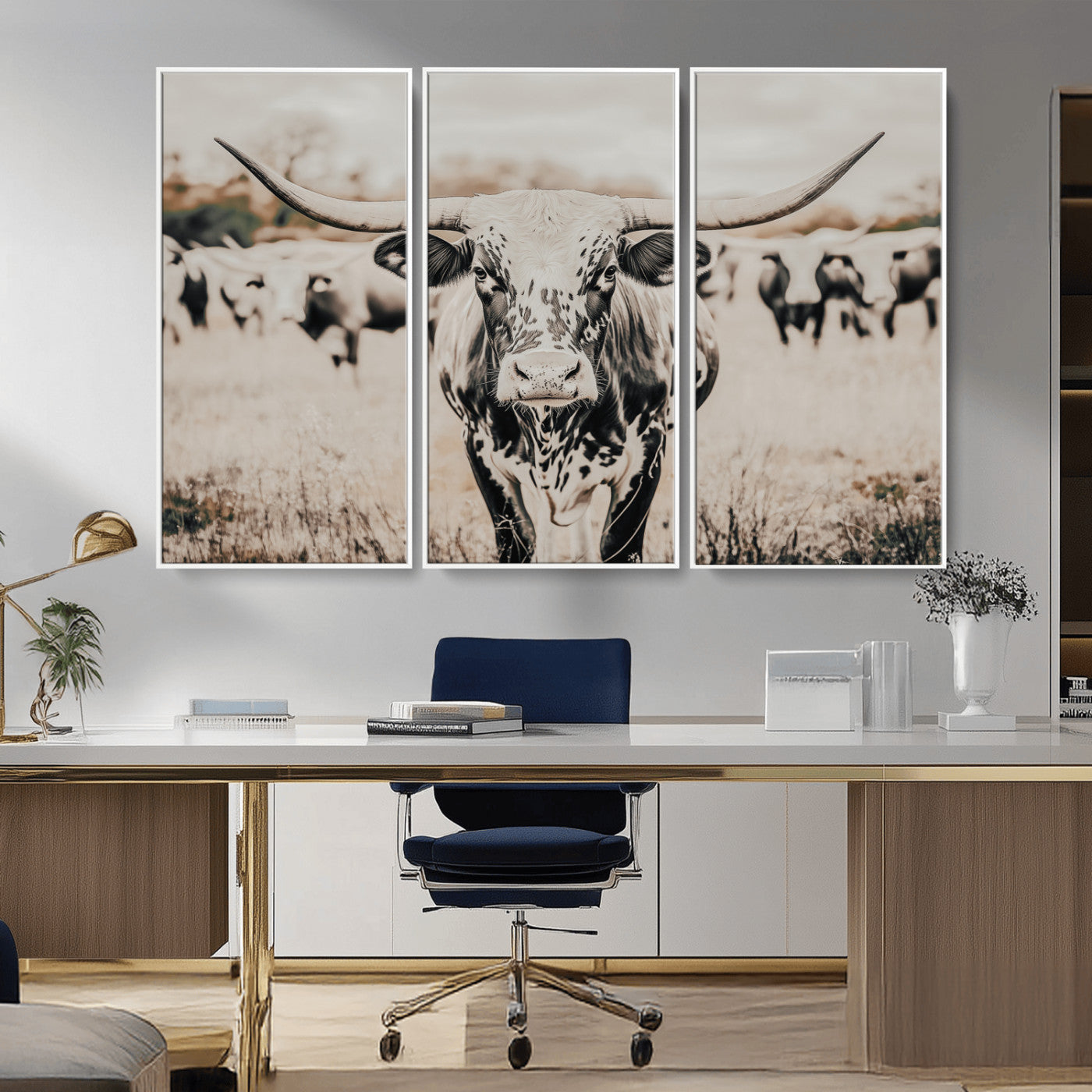 Canvas of a speckled Texas longhorn standing boldly in a field with a herd behind, perfect for rustic western or farmhouse wall decor.