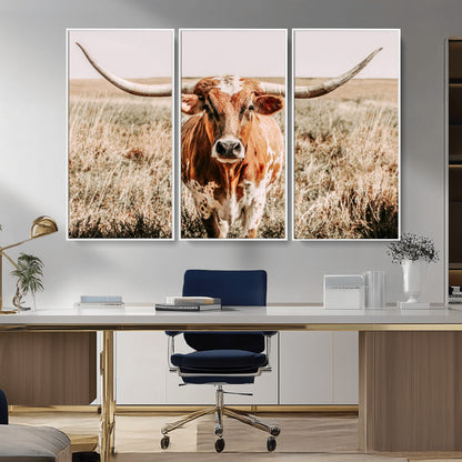 Framed longhorn cow canvas wall art with rustic prairie background, western animal print perfect for farmhouse or ranch style decor