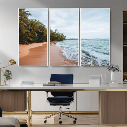 Framed canvas of a tropical beach with palm trees and soft waves, ideal for coastal escape or serene nature-inspired home decor.