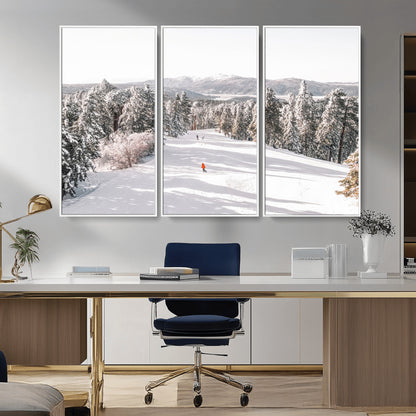 Bright ski trail lined with snow-covered pines and a skier in orange, perfect for alpine adventure or winter sports-inspired decor.