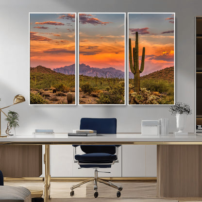 Vibrant desert sunset with saguaro cacti and distant mountains, perfect for Southwestern or warm-toned home decor.
