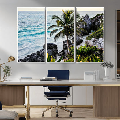 Framed canvas of a vibrant tropical coastline with palm trees, rocky cliffs, and turquoise waters, ideal for tropical coastal home decor.