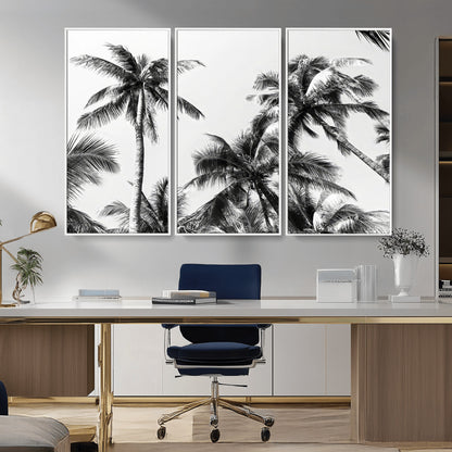 Black and white canvas of tall palm trees in moody tones, perfect for modern tropical minimalist or coastal-style home decor.