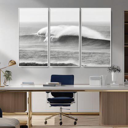 A dramatic black and white ocean wave crashing with immense force, capturing the raw power and movement of the sea in a bold seascape.