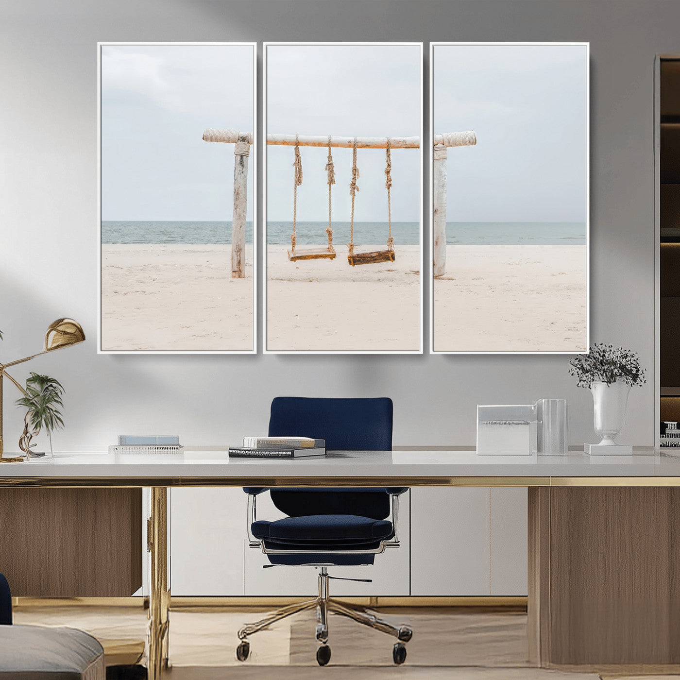 A rustic wooden beach swing stands on a serene sandy shore with an ocean horizon in the background, creating a tranquil and dreamy coastal escape.