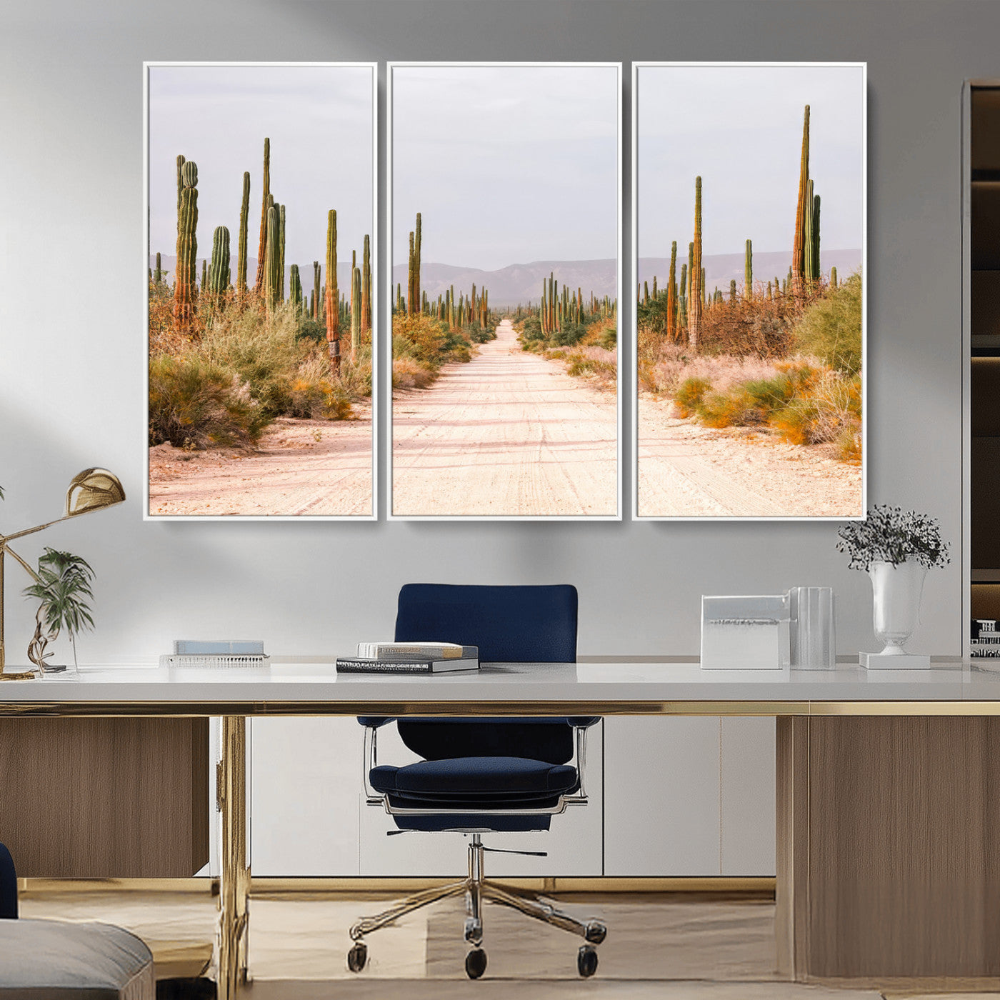 A desert road lined with saguaro cacti under a golden sky, creating a warm southwestern feel, perfect for boho or rustic decor.