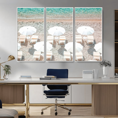 A bright beach scene with white umbrellas, pastel sand, and turquoise waters, creating a tranquil coastal vibe, perfect for beach house or summer decor.