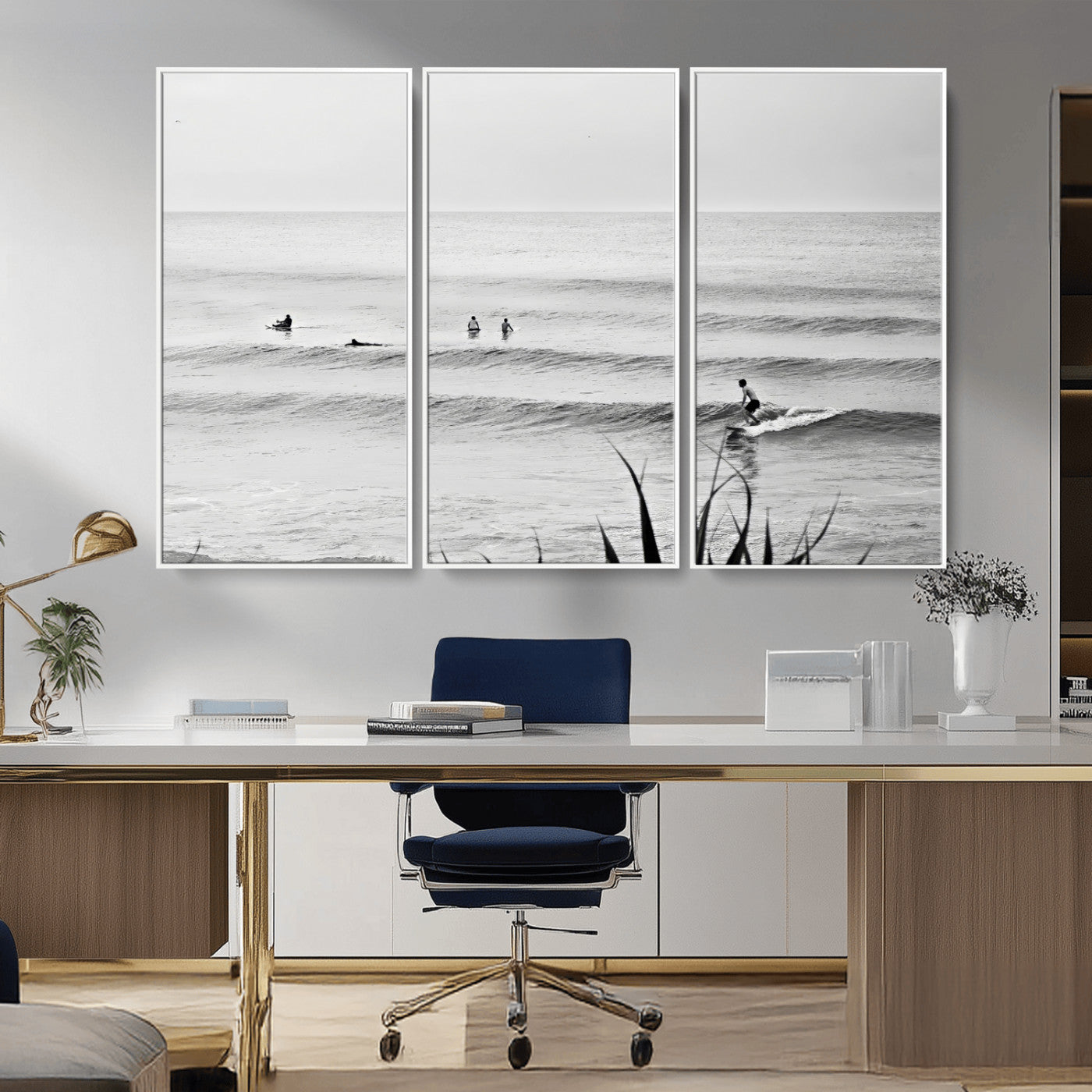 Monochrome canvas of surfers on calm ocean waves, ideal for minimalist coastal or beach-inspired interior decor.
