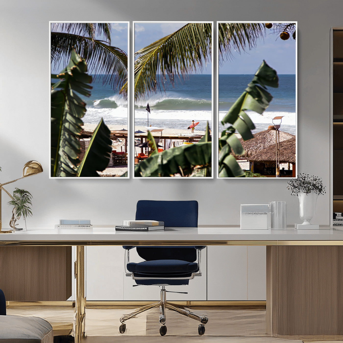 Canvas wall art of a tropical surf scene framed by palm trees, with a surfer on the shore and waves rolling in, ideal for beach-themed decor.