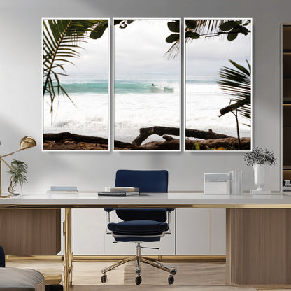 Tropical beach view with palm trees and surfer riding a wave, perfect for boho or coastal-inspired interior wall decor.