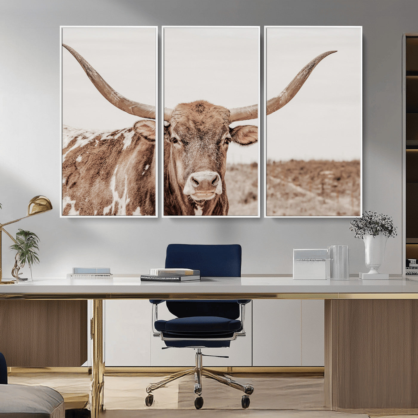 A longhorn cow in soft beige desert tones, standing calmly in open land, perfect for neutral western or rustic farmhouse interiors.