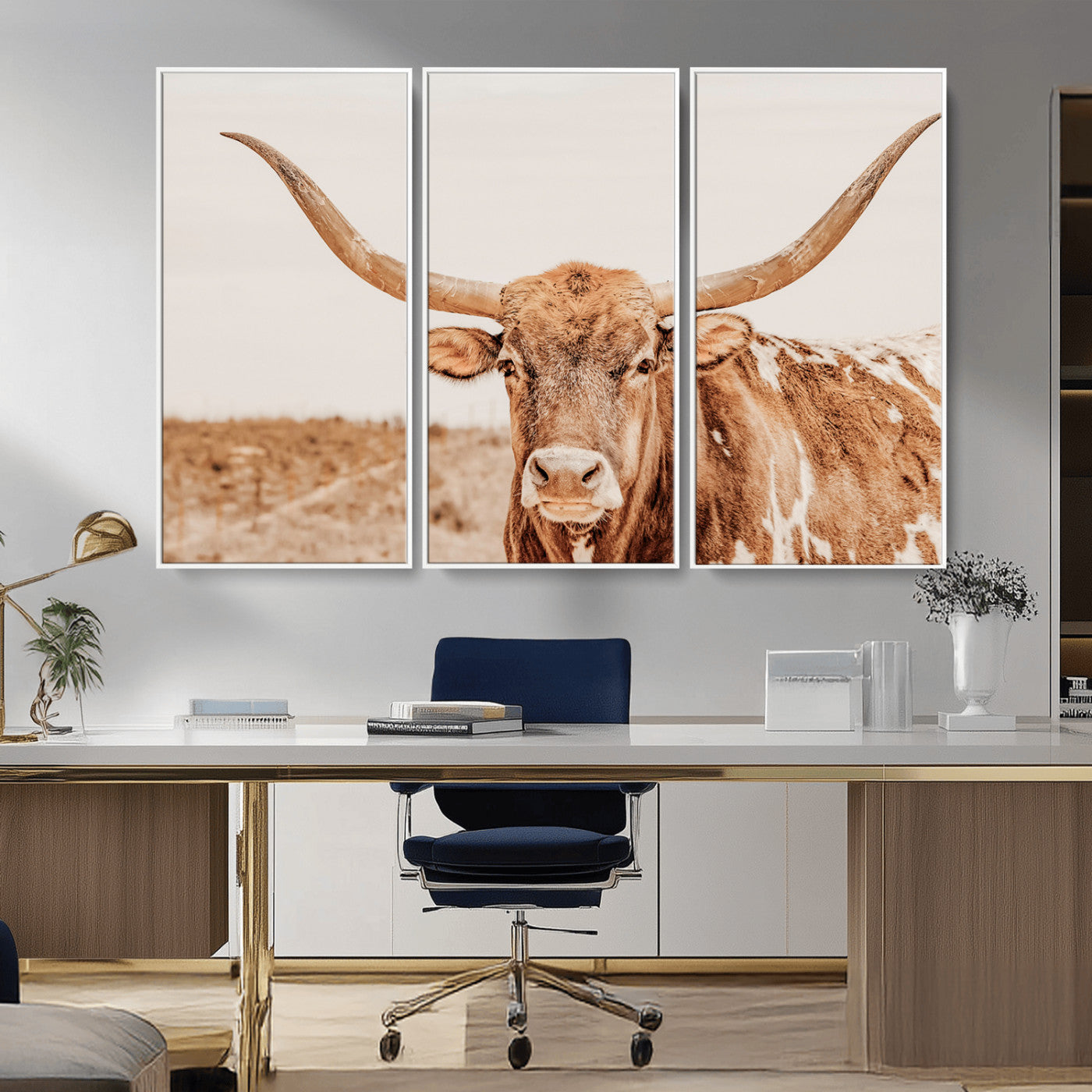 A longhorn bull standing proudly in a sunlit desert field with warm neutral tones, ideal for rustic western or farmhouse interiors.