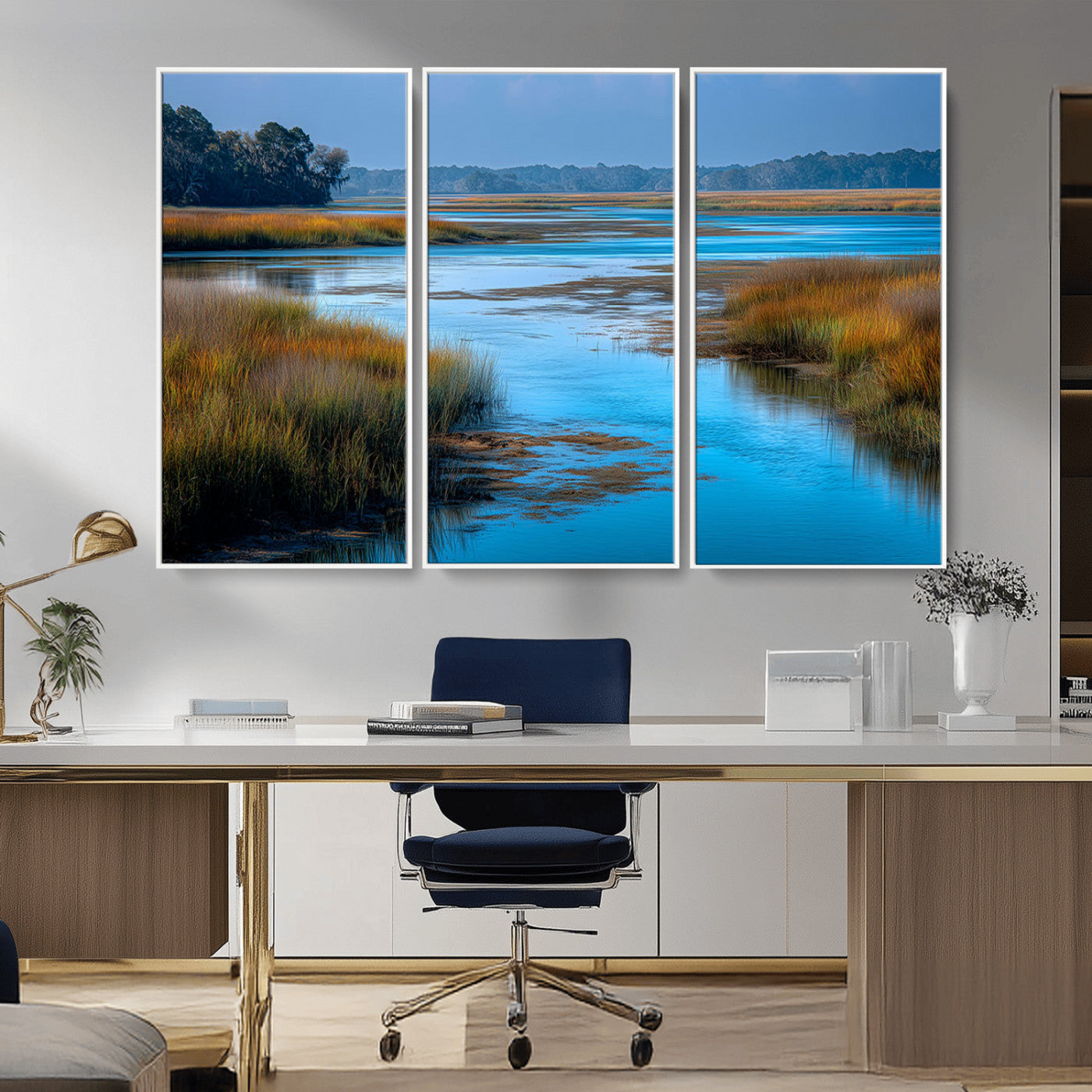 A peaceful marshland scene with calm blue water reflecting the surrounding grasses and trees, capturing the beauty of nature in a serene landscape.