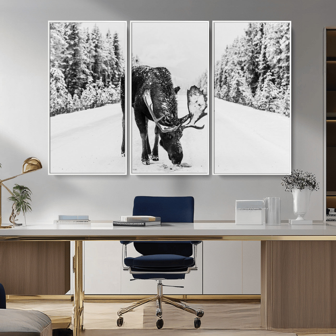 A majestic moose grazing in the snow-covered wilderness, surrounded by snow-covered trees, creating a peaceful winter scene.