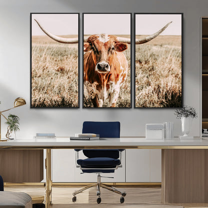 Framed longhorn cow canvas wall art with rustic prairie background, western animal print perfect for farmhouse or ranch style decor
