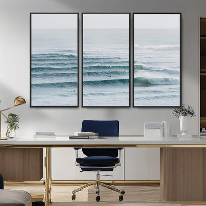 High-angle view of surfers lining up across layered ocean waves, ideal for minimal coastal or surf-inspired room decor.