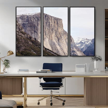 Framed canvas of El Capitan’s vertical granite face in Yosemite with snowy peaks, ideal for Sierra minimalism or mountain-inspired decor.
