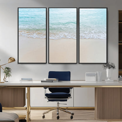 Soft shoreline with gentle aqua waves on smooth sand, ideal for minimalist coastal or pastel ocean-inspired home wall decor.