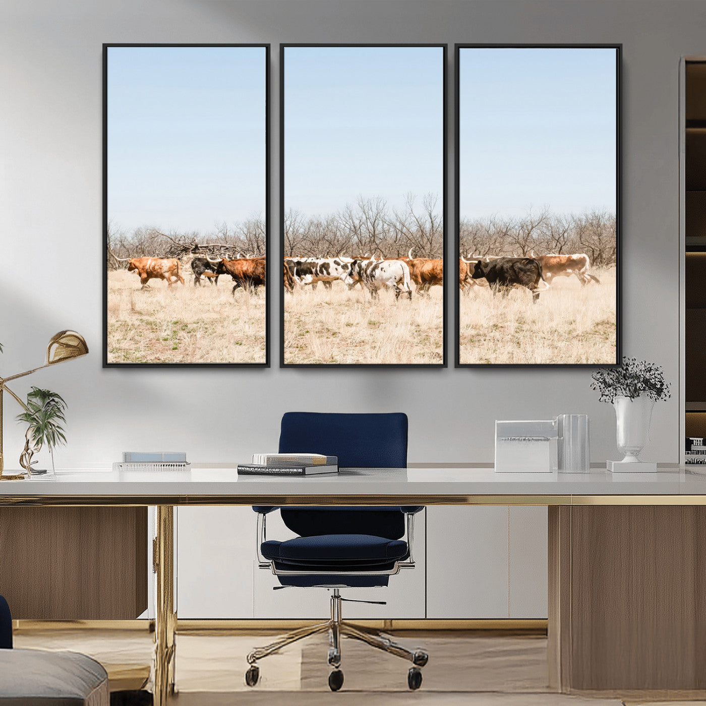 Framed wall art of Texas longhorn cattle walking through a dry, neutral-toned prairie, perfect for rustic farmhouse or western-themed home decor.