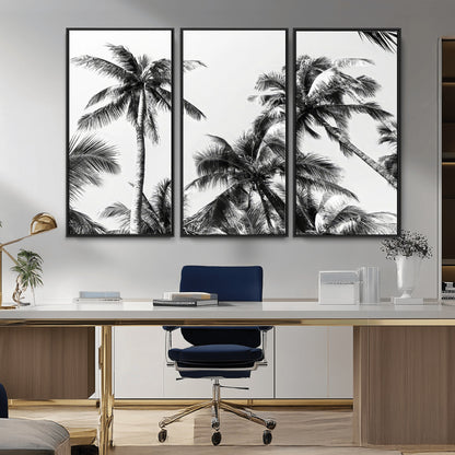 Black and white canvas of tall palm trees in moody tones, perfect for modern tropical minimalist or coastal-style home decor.