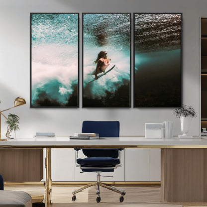 Vibrant underwater photo of a female surfer diving through turquoise waves, perfect for coastal boho or surf-inspired home decor.