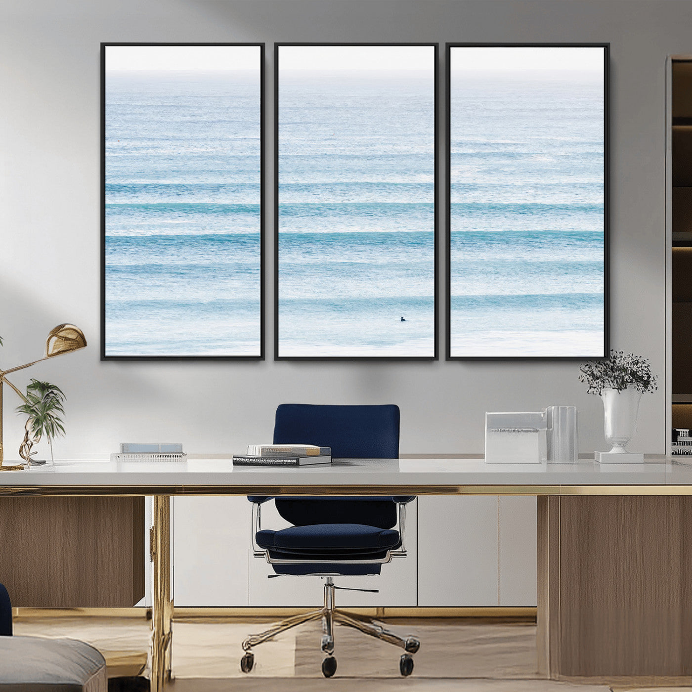 Minimalist ocean view with soft blue waves and a lone surfer, creating a serene and airy coastal aesthetic, perfect for tranquil home decor.