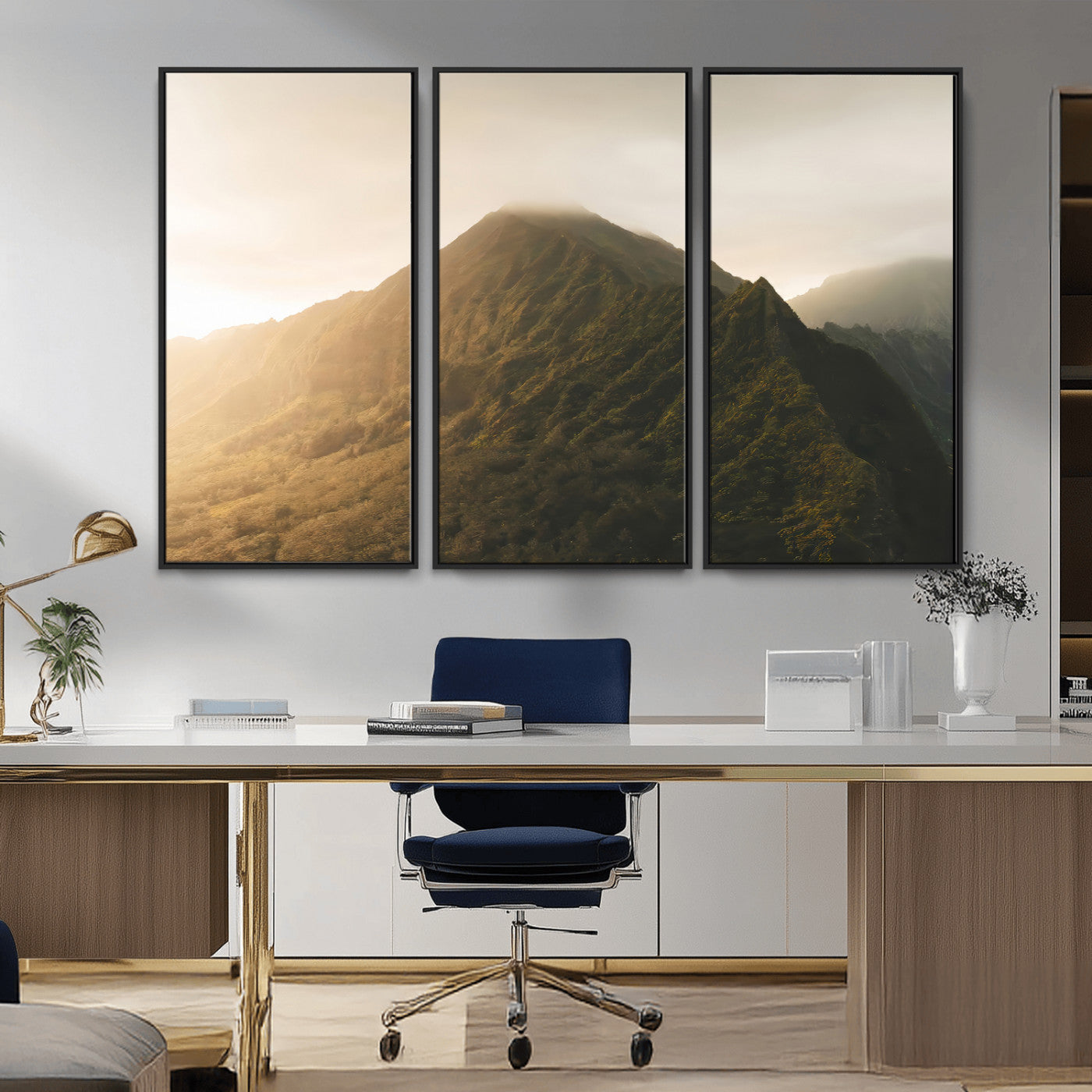 Sunlit mountain peak with mist rolling over its rugged slopes, bathed in golden light, creating a warm and tranquil nature-inspired scene.